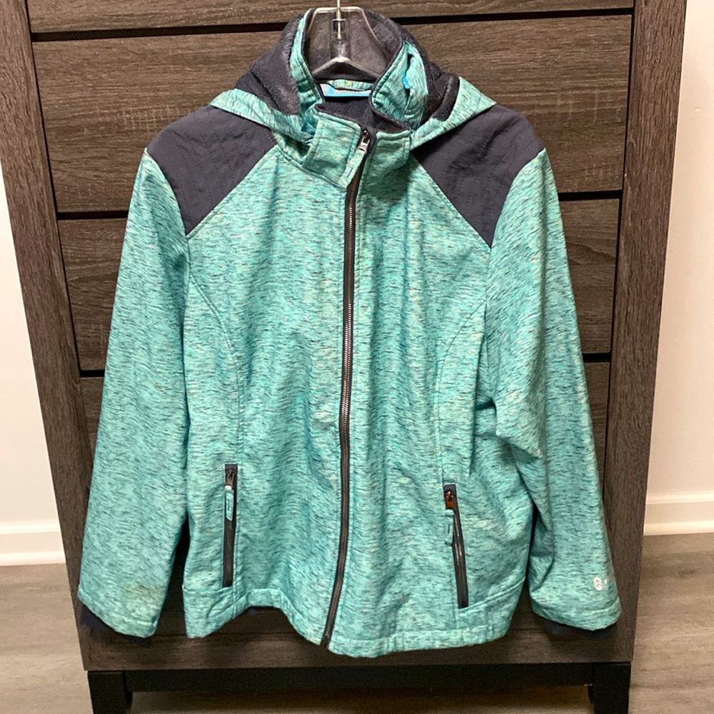 A green and gray Free Country winter jacket